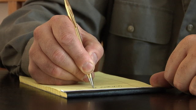 Businessman taking notes