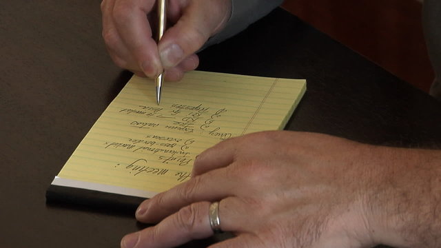 Businessman taking notes