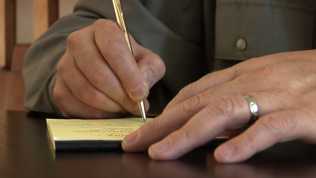 Businessman taking notes