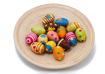 Easter eggs on wooden plate © teprzem