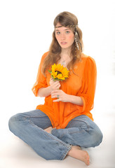 Hippie flower child girl holding flower