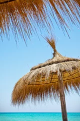 Gordijnen Sunshades on the beach © NordCry