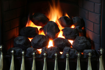Domestic home gas fireplace imitating an open coal fireplace
