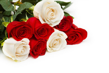 Naklejka premium Red and white roses isolated on white