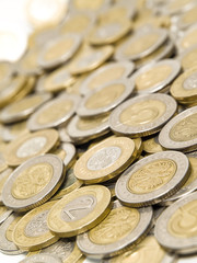 Scattered polish coins. Shallow DOF. Focus on 2.