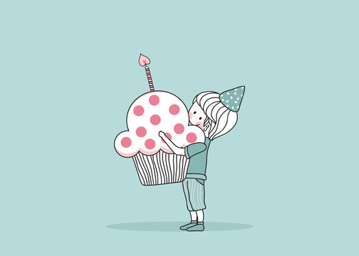 boy with birthday cupcake