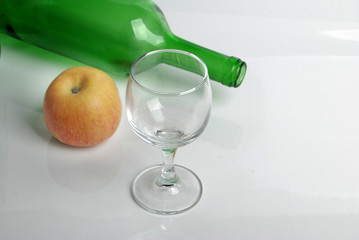 apple and wine bottle