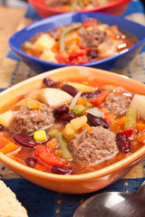 Meatball soup with vegetables and red kidney beans
