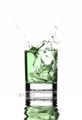 Beautiful splash of ice in the glass