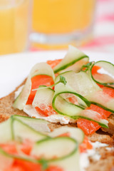 Toasts  with vegetables and fish