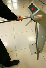Security officer at a turnstile