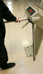 Security officer at a turnstile