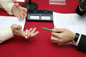 Hands of two businessmen discussing business strategy