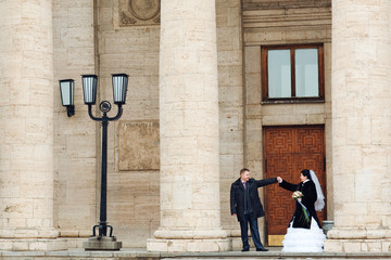couple near the columns