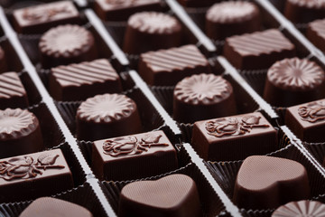 assorted chocolate candies in box