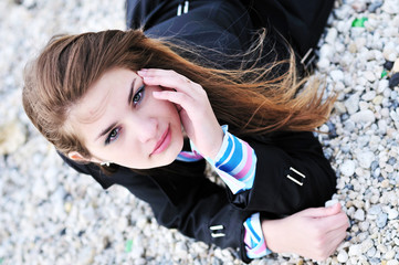 girl laying on the beach