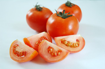 close up of few tomato with white background