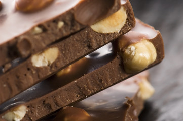Pile of broken chocolate with nuts