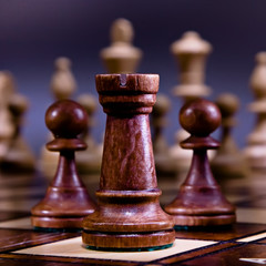 Chess on the dark background.