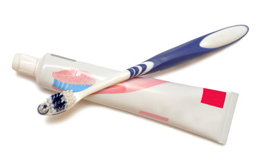 Toothbrush beside toothpaste