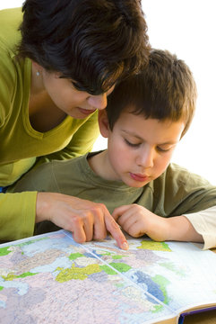 teacher and child over map