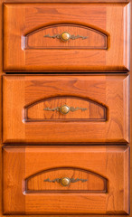 Three wooden drawers