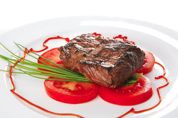 roast meat served on plate