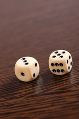 dice on wooden table