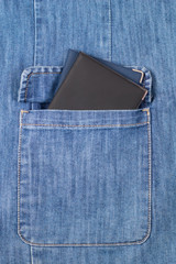 Two passports in a jacket pocket close up.