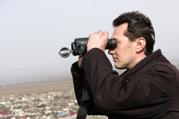 Man with binoculars