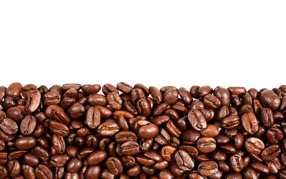 Roasted coffee beans with copy space on the top