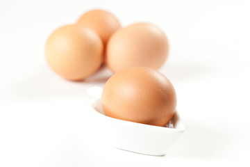 raw brown egg isolated