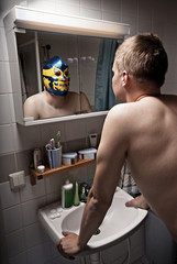 Humorous portrait of a man seeing him self as a wrestler.