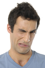 Obraz premium Young man with an exaggerated sad face