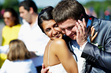 Bride and groom received congratulations on the phone