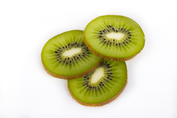 Kiwi slices on white plate