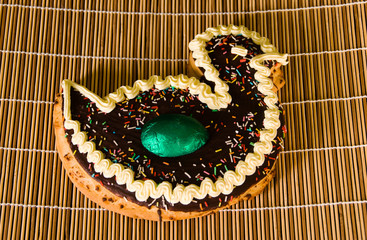 Figolla, traditional Maltese easter sweet, on a straw mat