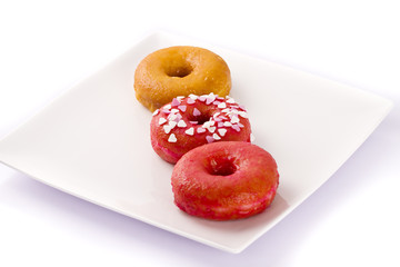 Colorful donut on a plate