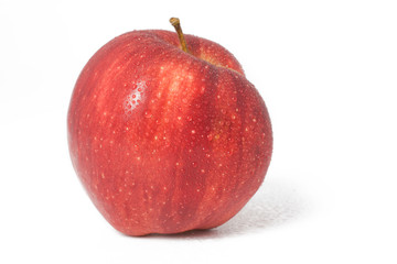 fresh red apple with drops of water