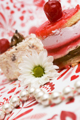 sweet fruit red cake with cherry and white camomile