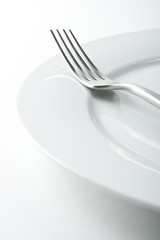 Fork on White Plate