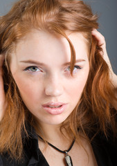 Naklejka premium fashion portrait of a red hair sexy woman