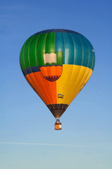 Flying balloon at sunrise