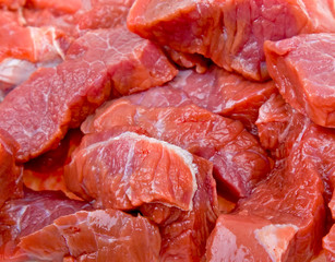 Close-up fresh natural meat to background