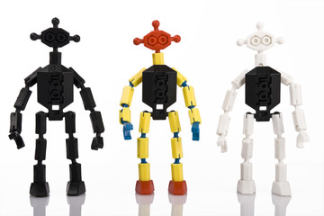 three toy bricks peoples