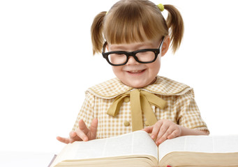 Cute little girl reads book, back to school
