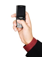 Businessman's hand holding a cell phone - isolated on white