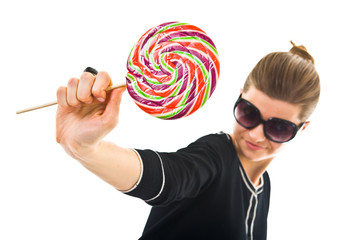 Young woman with a lollipop
