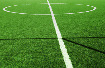 Obraz premium Green grass football field
