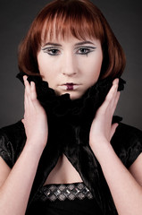 Obraz premium Close-up portrait of beautiful girl with chess makeup